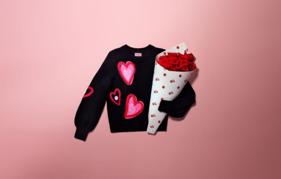 From Kate Spade New York, an overlapping heart sweater. — Picture courtesy of Kate Spade New York