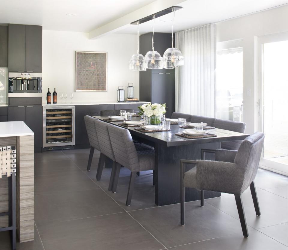 A rich, gray contemporary dining room