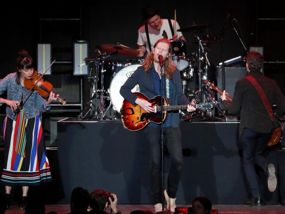 the lumineers performing on stage