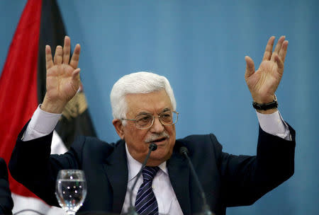 Palestinian President Mahmoud Abbas gestures as he speaks to the media in the West Bank city of Ramallah January 23, 2016. REUTERS/Mohamad Torokman/File Photo