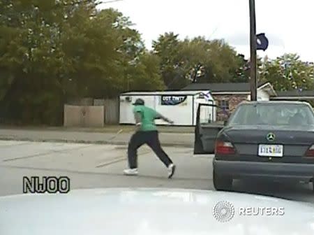 A still image taken from police dash cam video allegedly shows Walter Scott running from his vehicle during a traffic stop before he was shot and killed by white police officer Michael Slager in North Charleston, South Carolina, in this file photo received April 7, 2015. REUTERS/South Carolina Law Enforcement Division/Handout via Reuters/Files