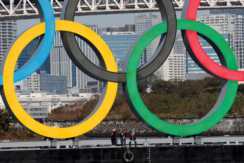 FILE PHOTO: Olympic rings reinstallation at the waterfront area at Odaiba Marine Park in Tokyo