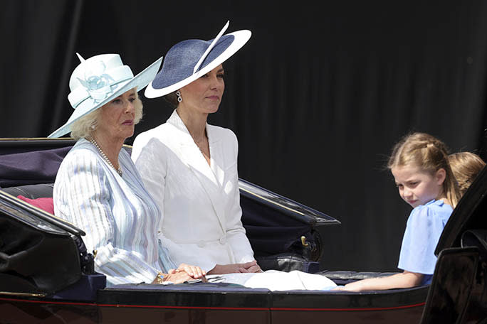 (L-R) Camilla, Duchess of Cornwall and Kate Middleton, Duchess of Cambridge ride in a carriage as they make their way to the Trooping the Color in London on June 2, 2022. - Credit: AP