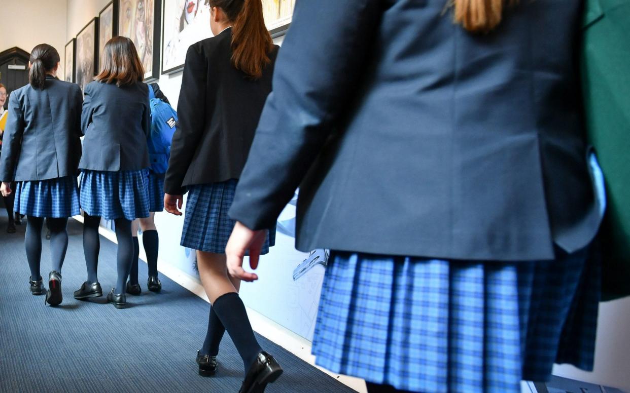 A headteacher sent an email to pupils discouraging them missing school because of their periods  -  Ben Birchall/PA