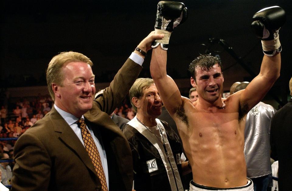 Warren with Welsh boxing icon Joe Calzaghe in 2003 (Getty)
