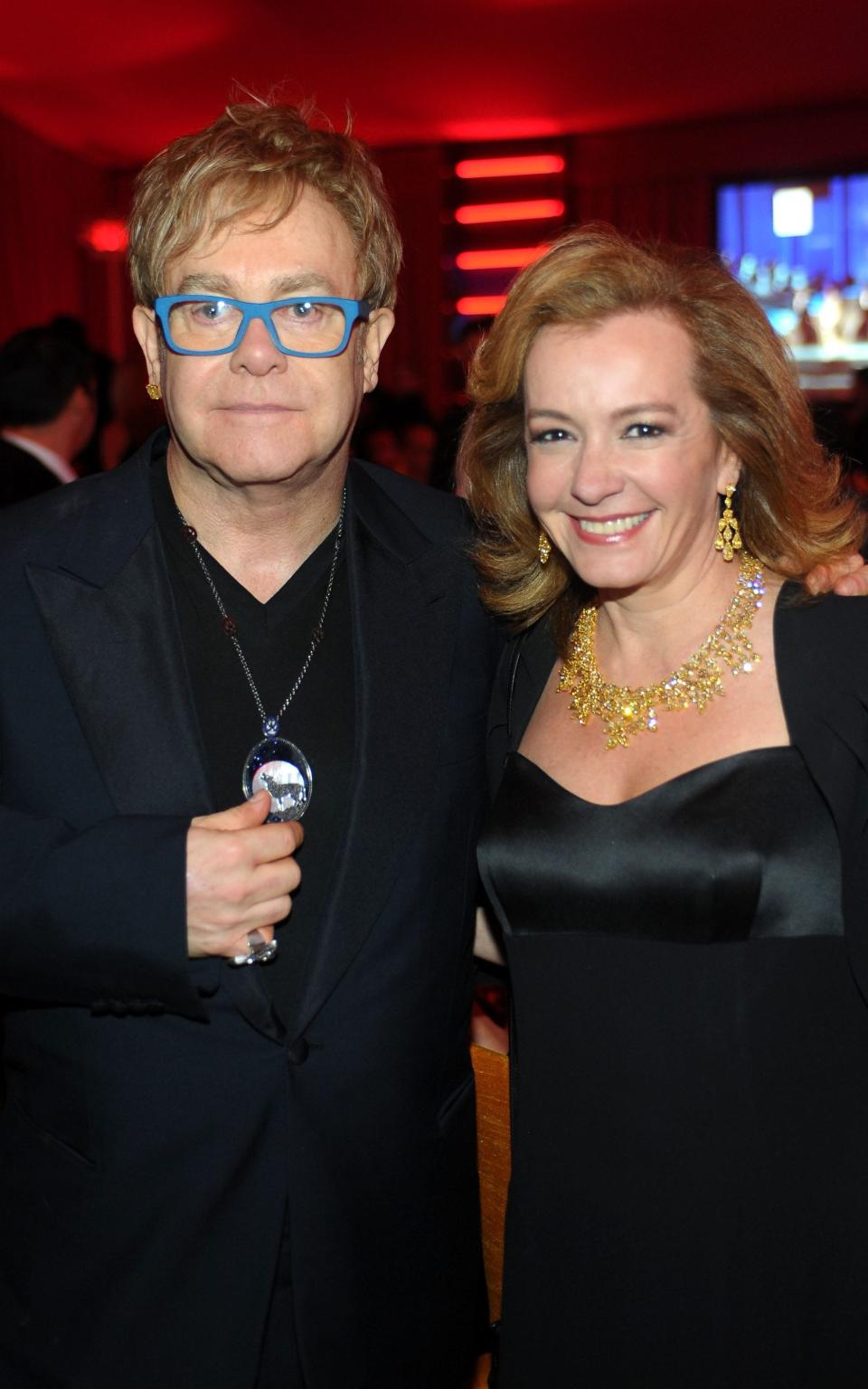 Caroline Scheufele and Elton John - Getty Images