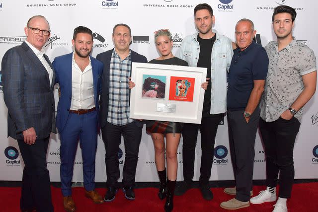 <p>Lester Cohen/Getty</p> Steve Barnett, Jeremy Vuernick, Glenn Mendlinger, Halsey, Jason Aron, Ashley Newton, and Anthony Li attend Capitol Music Group's Premiere Of New Music And Projects For Industry And Media on August 9, 2017 in Hollywood, California.