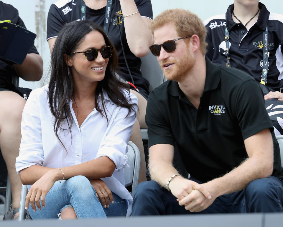 TORONTO, ON - SEPTEMBER 25:  Prince Harry (R) and Meghan Markle (L) attend a Wheelchair Tennis match during the Invictus Games 2017 at Nathan Philips Square on September 25, 2017 in Toronto, Canada  (Photo by Chris Jackson/Getty Images for the Invictus Games Foundation )