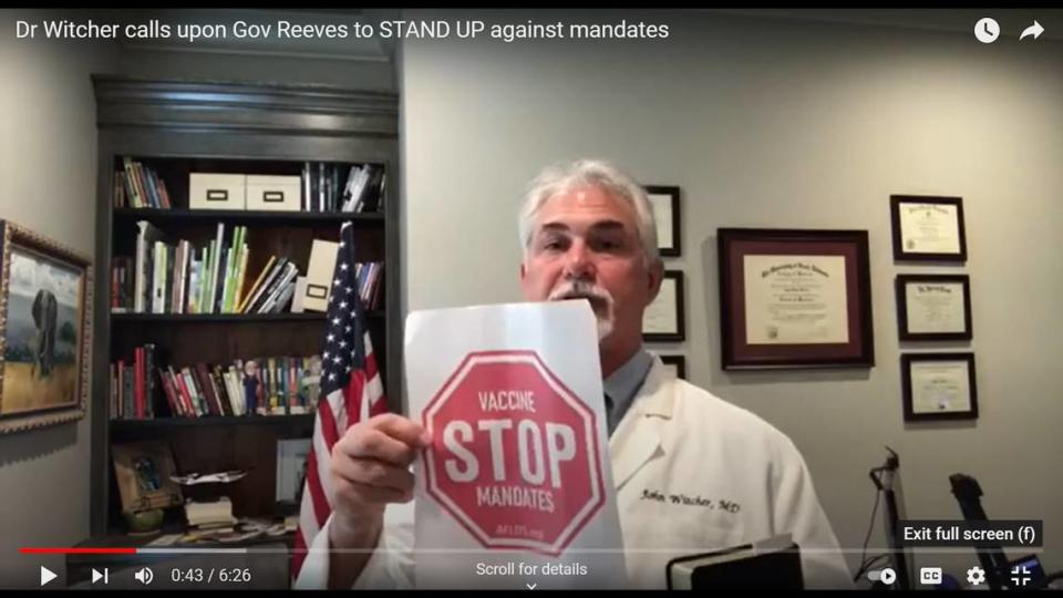 This screenshot of a YouTube video shows Dr. John Witcher talking about his opposition to COVID-19 vaccine mandates.