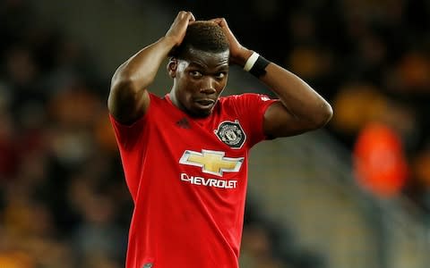 Manchester United player Paul Pogba was subjected to racist abuse after missing a penalty in Monday's game against Wolves - Credit: Reuters