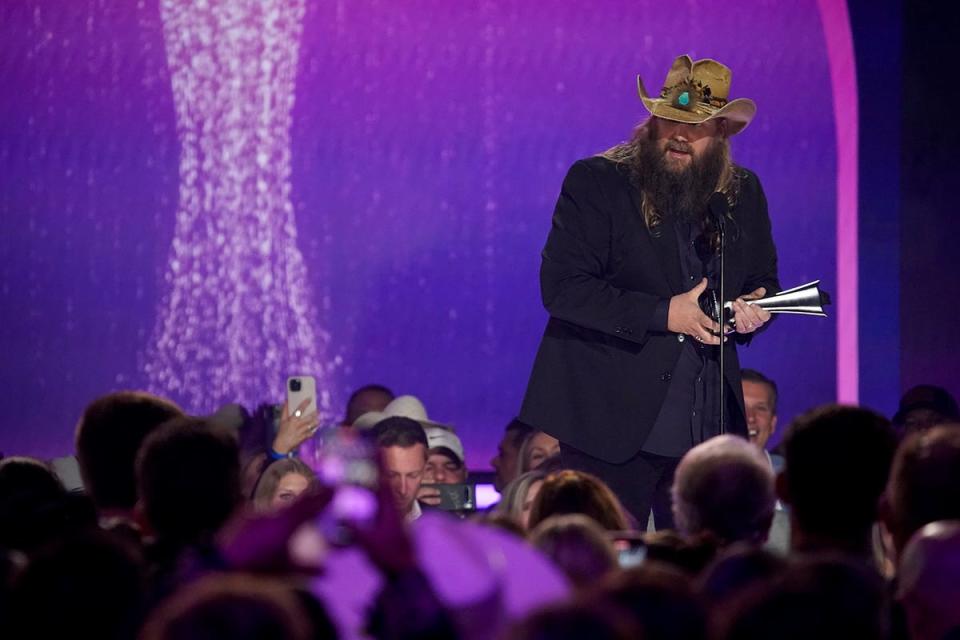 Chris Stapleton receives his male artist of the year award.