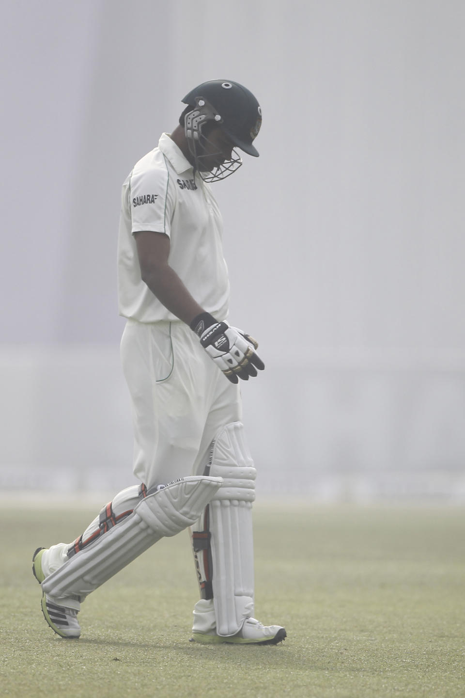 Bangladesh’s Marshall Ayub returns to the pavilion after his dismissal by Sri Lanka’s Suranga Lakmal on the fourth day of their first test cricket match in Dhaka, Bangladesh, Thursday, Jan. 30, 2014. (AP Photo/A.M. Ahad)