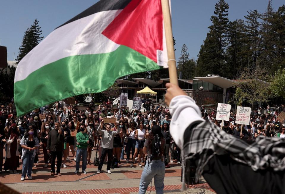 Pro-Palestinian protesters gather in front of Sproul Hall on the UC Berkeley campus on April 22, 2024.<span class="copyright">Justin Sullivan—Getty Images</span>