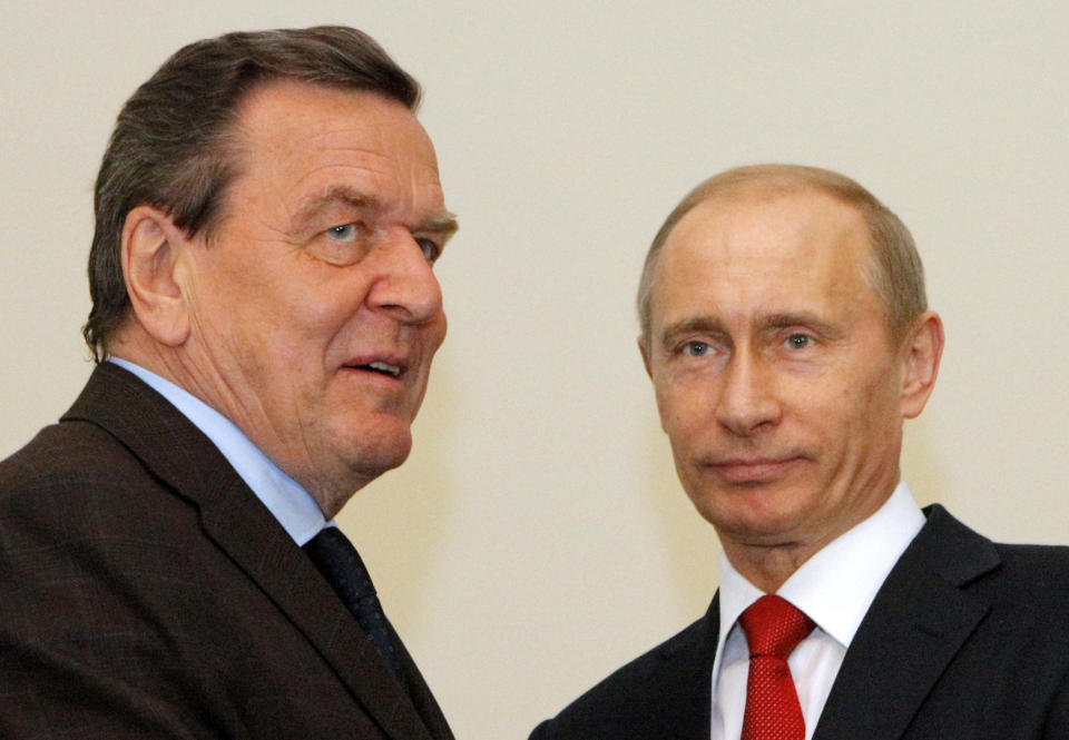 FILE- Russian Prime Minister Vladimir Putin, right, and former German chancellor Gerhard Schroeder during their meeting in St. Petersburg, Russia on April 4, 2009. Gerhard Schroeder left the German chancellery after a narrow election defeat in 2005 with an ambitious overhaul of the country’s welfare state beginning to kick in and every chance of becoming a respected elder statesman. Fast-forward to last week: German lawmakers agreed to shut down Schroeder’s taxpayer-funded office, the European Parliament called for him to be sanctioned, and his own party set a mid-June hearing on applications to have him expelled. Schroeder’s association with the Russian energy sector turned the 78-year-old into a political pariah in Germany after the invasion of Ukraine(AP Photo/Dmitry Lovetsky,file)