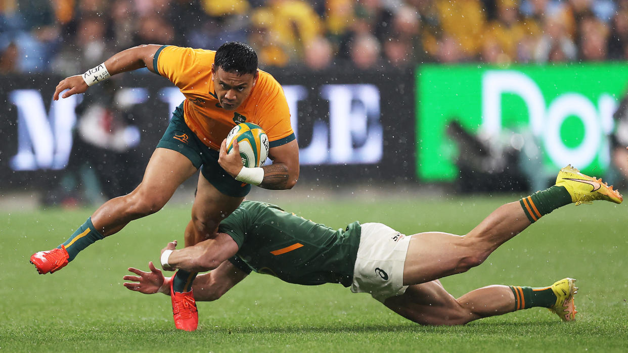  Len Ikitau of the Wallabies is tackled during The Rugby Championship 