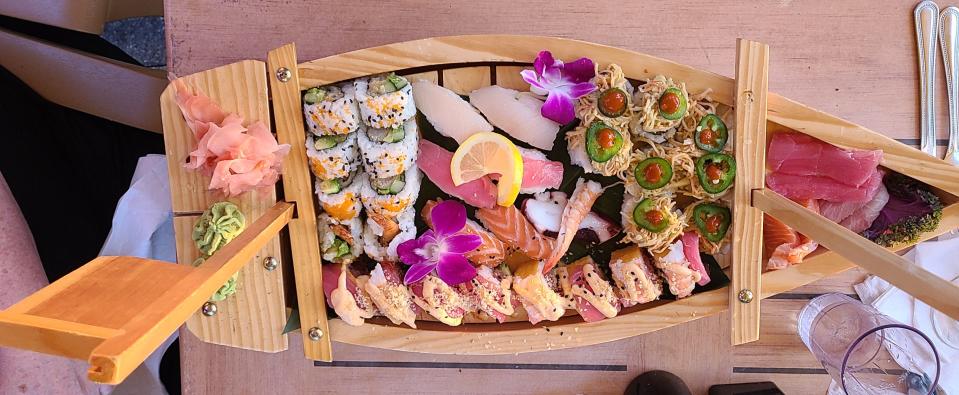 Mango's sushi boat for two ($85) easily serves three people.