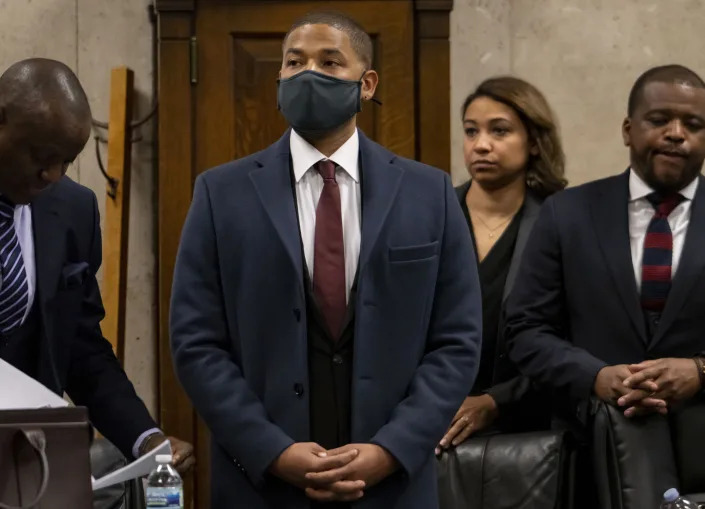 Actor Jussie Smollett appears with his attorneys at his sentencing hearing at the Leighton Criminal Court Building, Thursday, March 10, 2022, in Chicago. (Brian Cassella/Chicago Tribune via AP, Pool)