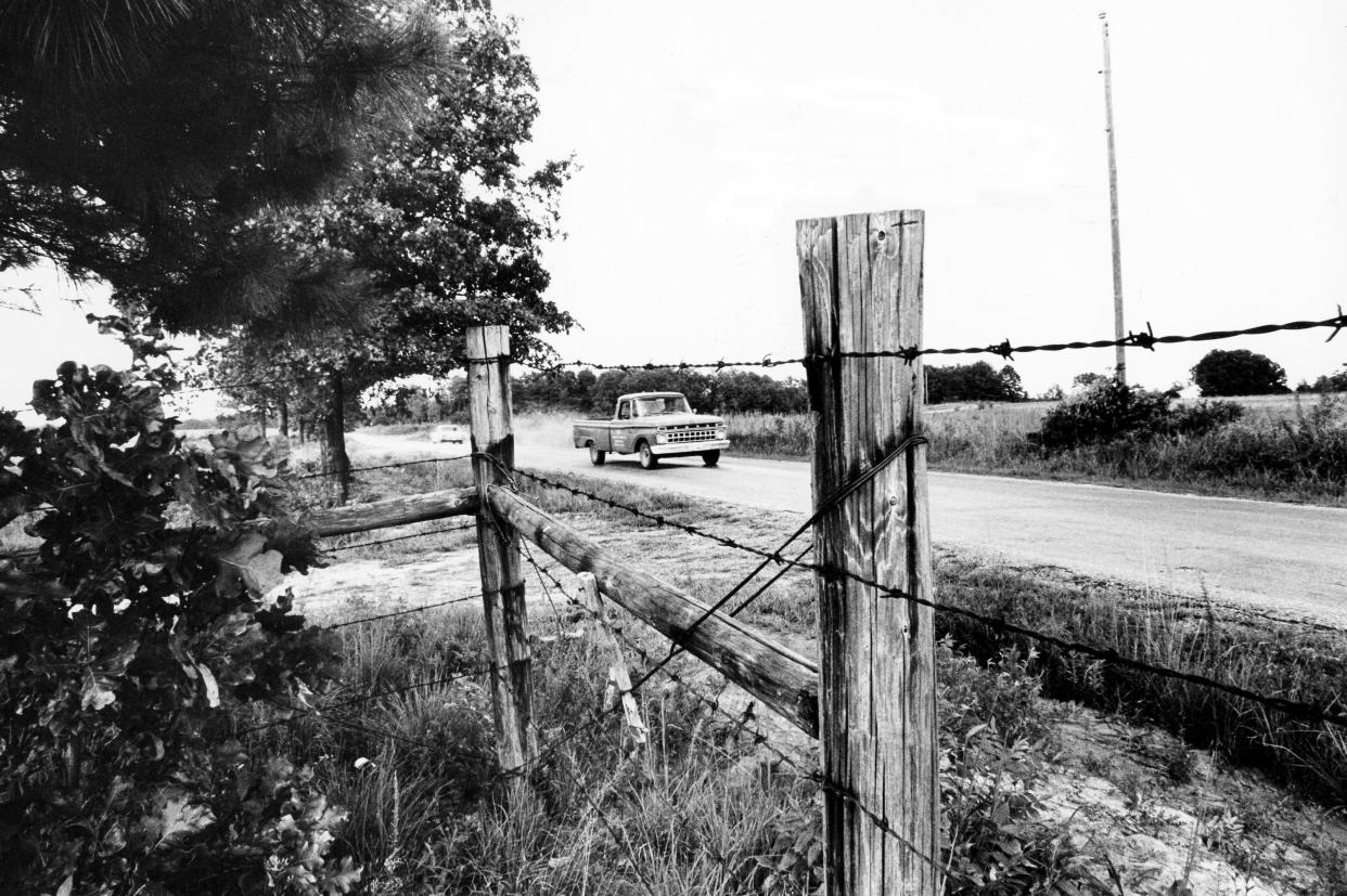At the point on New Hope Road in McNairy County, shown here Aug. 1, 1973, the gunmen caught up with Sheriff Buford Busser and shot him through the jaw at point blank range.