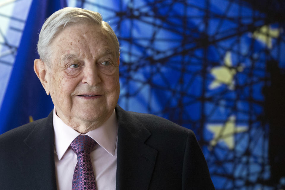 FILE - This Thursday, April 27, 2017 file photo shows George Soros, Founder and Chairman of the Open Society Foundation, before the start of a meeting at EU headquarters in Brussels. On Friday, Jan. 26, 2018, The Associated Press has found that stories circulating on the internet about Soros paying three Democrats millions of dollars to vote for a government shutdown are untrue. (Olivier Hoslet, Pool Photo, File, via AP)