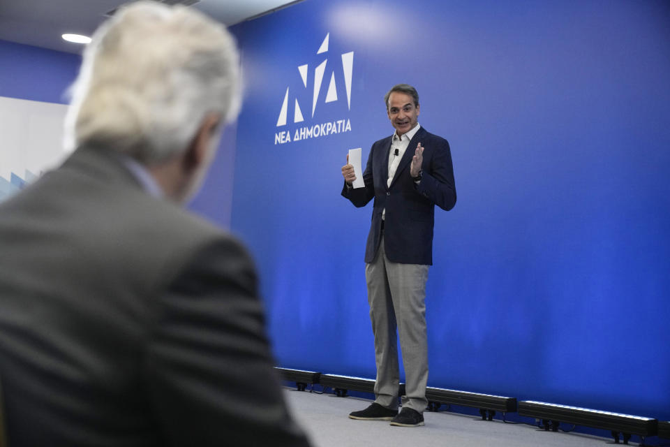 Greece's Prime Minister and New Democracy leader Kyriakos Mitsotakis speaks during the election campaign at the headquarters of his party in Athens, Greece, Friday, April 28, 2023. (AP Photo/Thanassis Stavrakis)