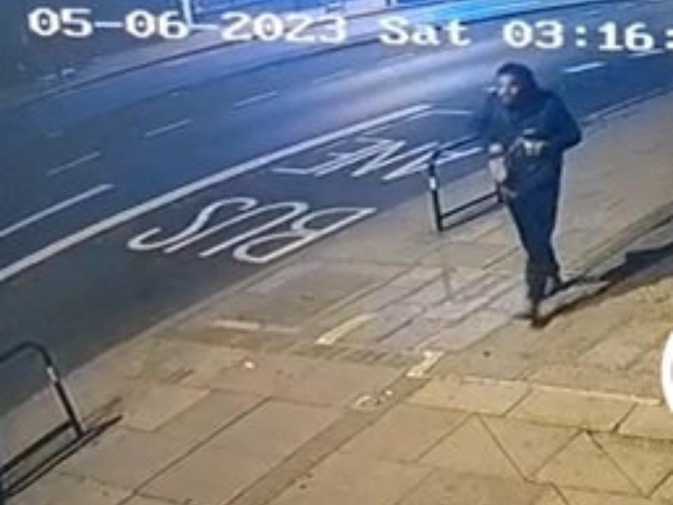 CCTV spotted a man matching the suspect's description walking along Streatham High Road on 6 May. (Met Police/SWNS)