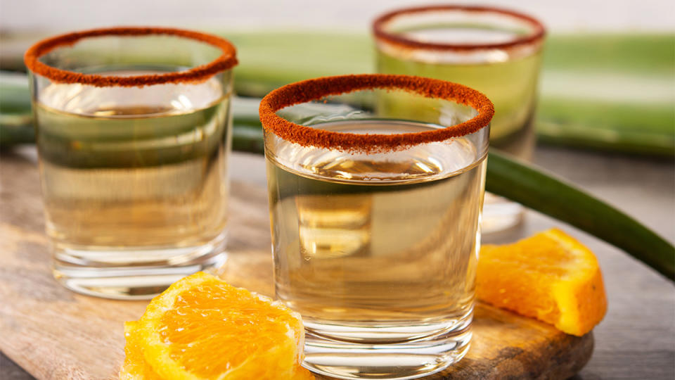 Shot glasses filled with mezcal as part our a guide on using this alcohol in cocktails