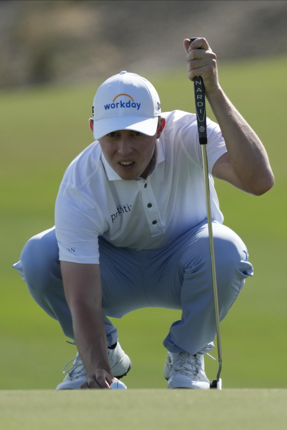 Matt Fitzpatrick, of England, lines up his putt on the third green during the third round of the Hero World Challenge PGA Tour at the Albany Golf Club, in New Providence, Bahamas, Saturday, Dec. 2, 2023. (AP Photo/Fernando Llano)