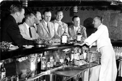 At Manhattan's 21 Club you used to have to wear a tie. How often do you catch your man in a tie nowadays? Photo via Wall Street Journal.