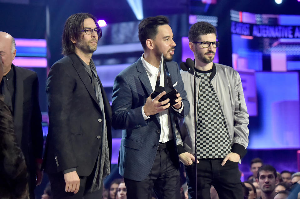 LOS ANGELES, CA - NOVEMBER 19:  (L-R) Rob Bourdon, Mike Shinoda, and Brad Delson of the band Linkin Park accept award onstage during the 2017 American Music Awards at Microsoft Theater on November 19, 2017 in Los Angeles, California.  (Photo by Jeff Kravitz/AMA2017/FilmMagic for dcp)