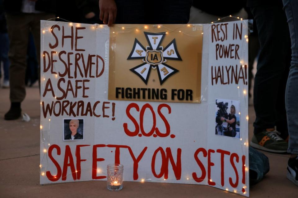 A sign at a vigil for Halyna Hutchins (REUTERS)