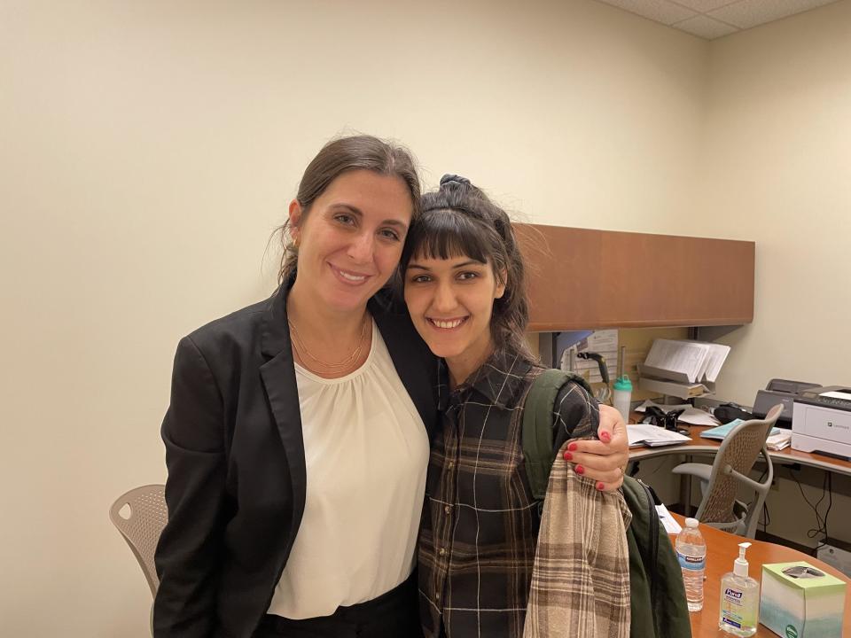 Daryaa and Frankie Allegra-Garofalo, a lawyer at the Milbank LLP law firm who is representing her, pose for a photo after Daryaa finished her asylum interview in Phoenix, Arizona. 