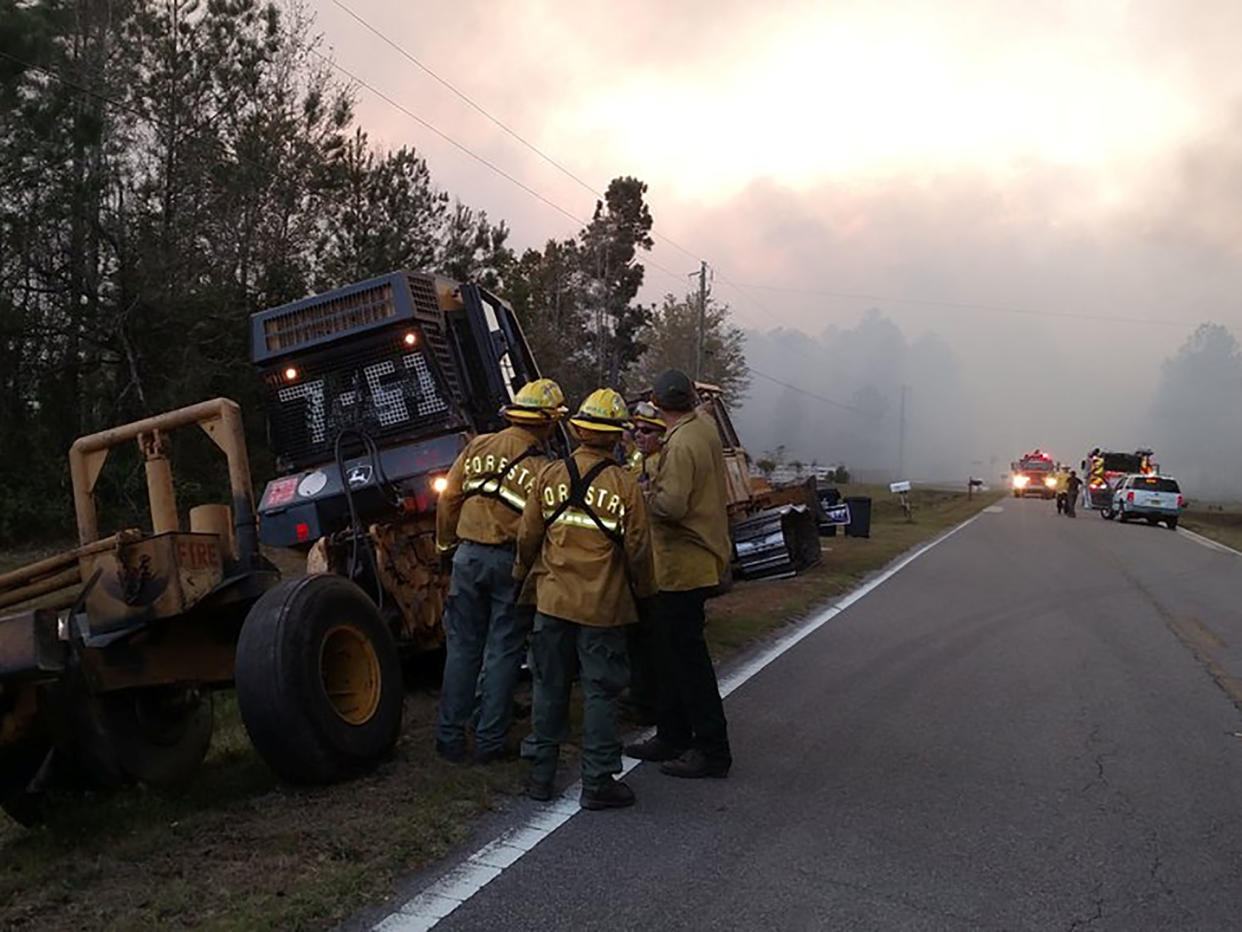 The wildfire burned an estimated 696 acres of land outside Jacksonville, a large city in the southeastern state: Reuters