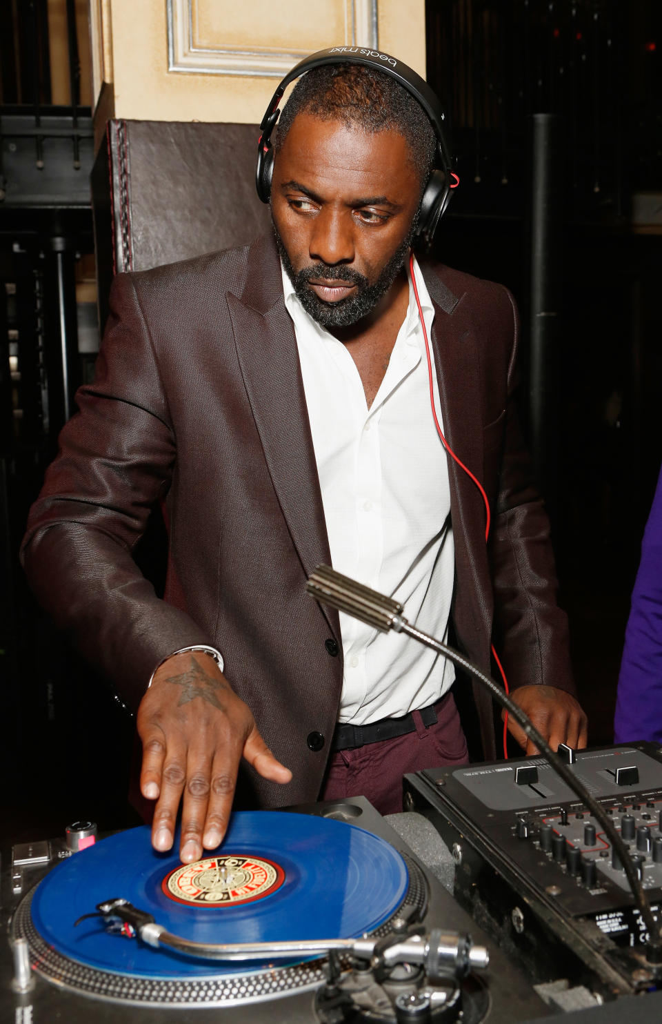 NEW YORK, NY - OCTOBER 13:  Actor Idris Elba spins at BET's Black Girls Rock 2012 After Party at Millesime - The Carlton Hotel on October 13, 2012 in New York City.  (Photo by Cindy Ord/Getty Images for BET)