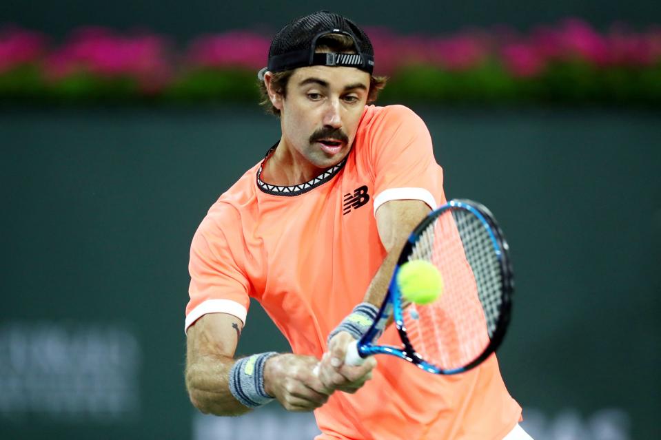 Jordan Thompson returns to Gael Monfils during the BNP Paribas Open at the Indian Wells Tennis Garden in Indian Wells, Calif., on Wednesday, March 8, 2023. Thompson defeated Monfils.