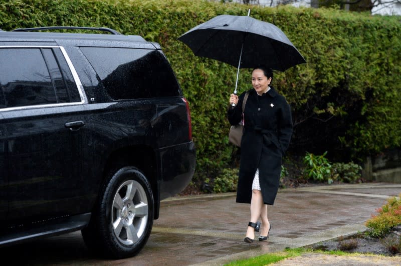 Huawei Chief Financial Officer Meng Wanzhou leaves her home to attend her extradition hearing in Vancouver