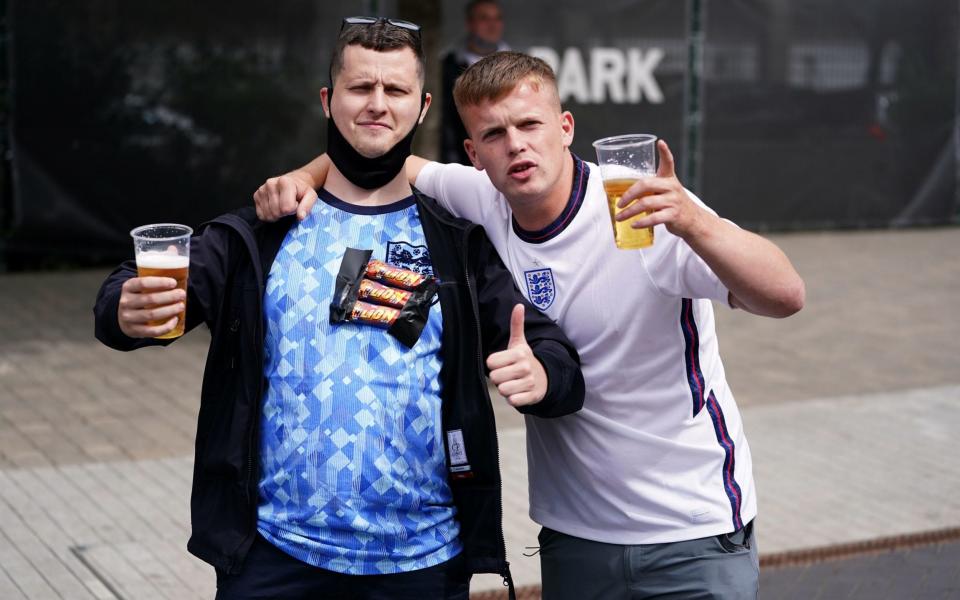 An England fan wearing three Lion chocolate bars on his chest outside Wembley Stadium - Mike Egerton/PA Wire.