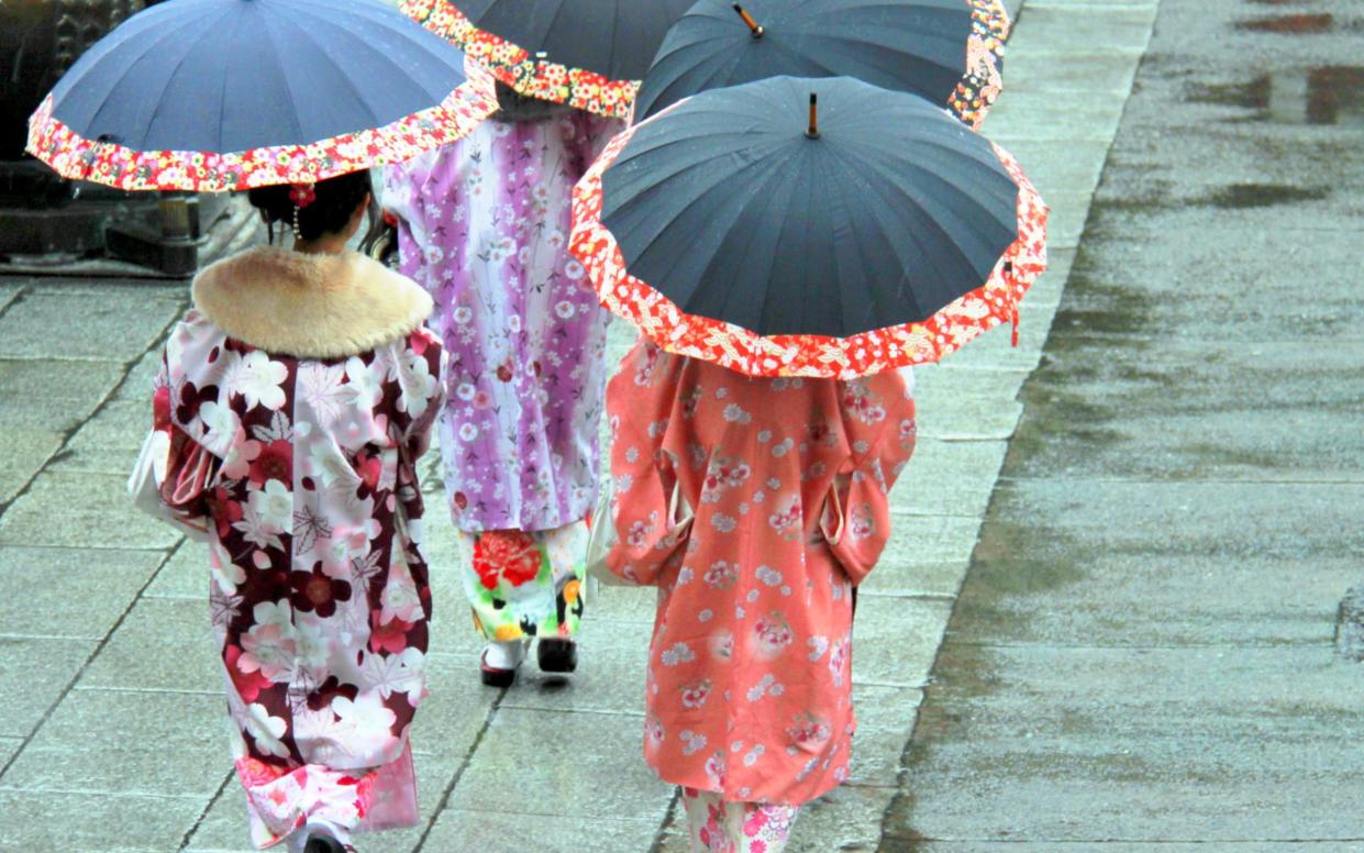 Young Japanese girls wearing typical traditional sarongs during the Lunar New Year celebrations in Tokyo