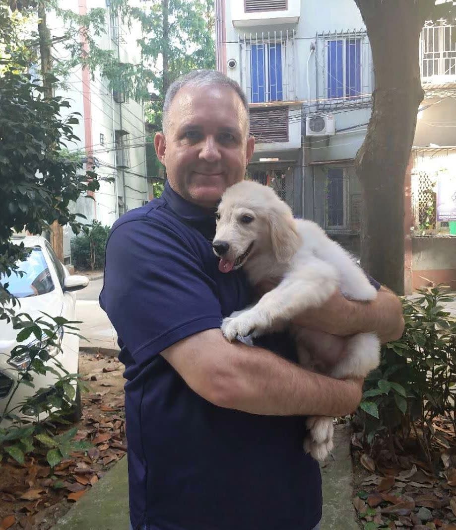 Paul N. Whelan, 48, of Novi was arrested Dec. 28, 2018, by the Russian government and accused of espionage. His family insists he's innocent, saying he was detained by mistake. In this undated photograph, he is seen holding a family dog.