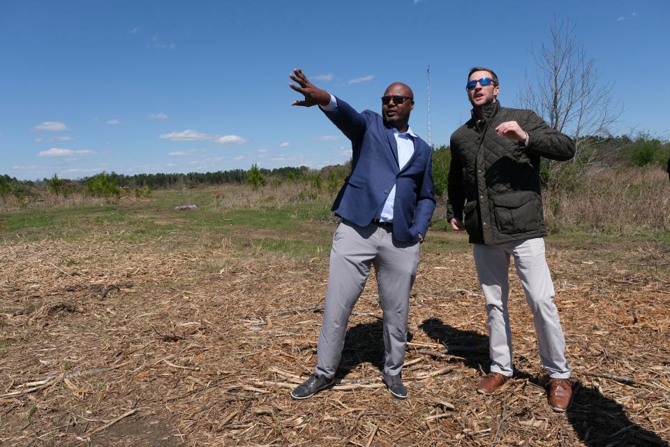 The City of Northport broke ground on Monday, March 18, 2024, on River Run Park, a sports complex that will be built on Oliver Dam Road. William Knox, left, from Legacy Sports Group, talks with Chase Lucas from TTL Inc. at the site where the fields will be developed.