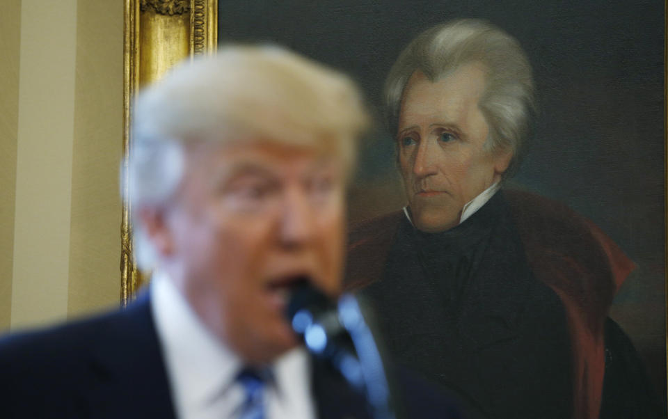 President Donald Trump speaks at the White House in front of a portrait of former President Andrew Jackson, who started a campaign of ethnic cleansing targeting Native Americans.&nbsp; (Photo: Kevin Lamarque / Reuters)