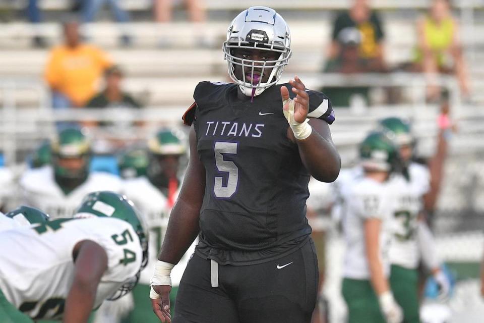 South Garner’s Nnamdi Ogboko (5) looks to the sidelines between downs against Enloe in the first half. The Enloe Eagles and the South Garner Titans met in a non-conference game in Wake Forest, N.C. on September 8, 2023.