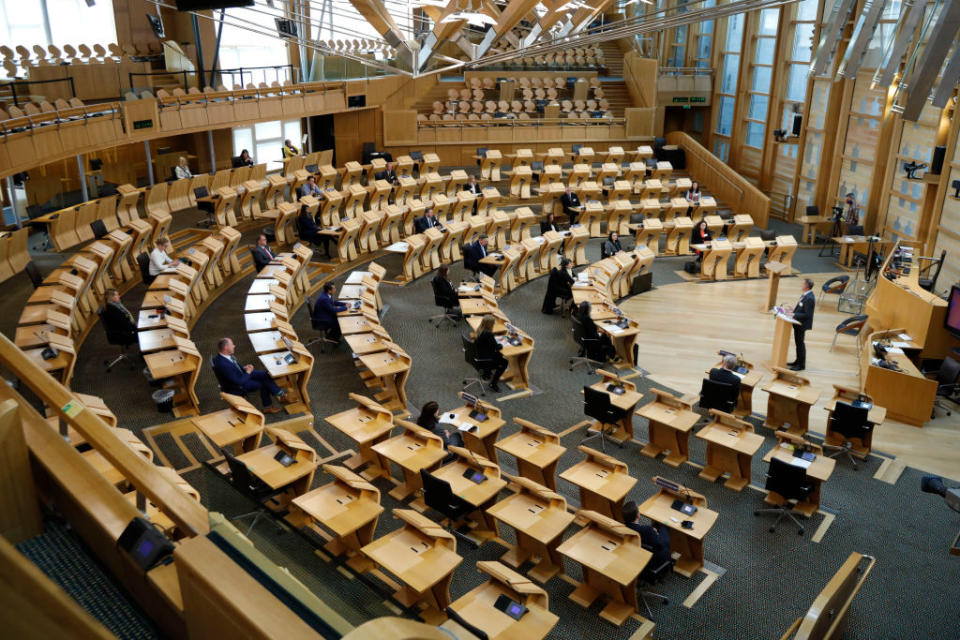 Newly elected members are welcomed to the Scottish Parliament chamber at Holyrood on May 10, 2021 in Edinburgh, Scotland.<span class="copyright">Andrew Cowan - Pool/Getty Images</span>