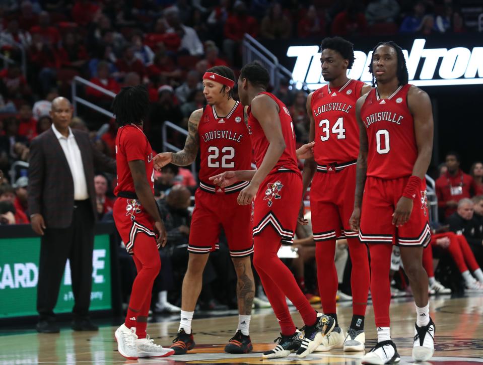 Louisville’s team gets ready to get out of a timeout against Kentucky Thursday evening at the KFC Yum Center.
Dec. 21, 2023