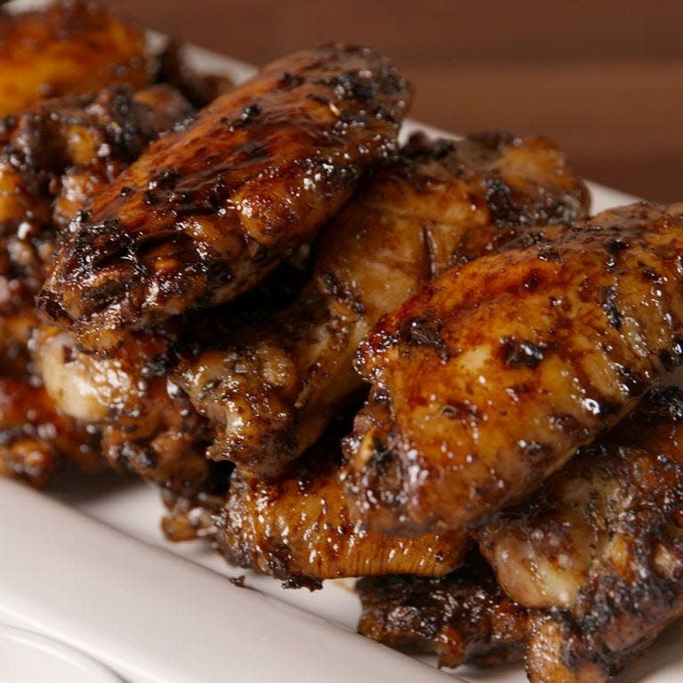 <p>Why have we never done this before? Chicken wings + balsamic vinegar = insane flavours. </p><p>Get the <a href="https://www.delish.com/uk/cooking/recipes/a35642664/balsamic-glazed-wings-recipe/" rel="nofollow noopener" target="_blank" data-ylk="slk:Balsamic Glazed Chicken Wings" class="link ">Balsamic Glazed Chicken Wings</a> recipe.</p>