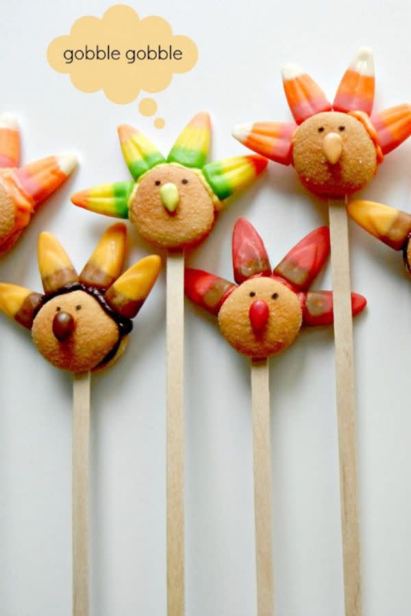 <p>Using mini wafers, candy, and sunflower seeds, this edible craft is sure to be a hit with the kids at your <a rel="nofollow noopener" href="https://www.womansday.com/food-recipes/food-drinks/g1975/thanksgiving-appetizers/" target="_blank" data-ylk="slk:Thanksgiving feast;elm:context_link;itc:0;sec:content-canvas" class="link ">Thanksgiving feast</a>.</p><p><strong>Get the tutorial at <a rel="nofollow noopener" href="http://www.sugarswings.com/2012/11/mini-candy-and-cookie-turkey-pops.html" target="_blank" data-ylk="slk:Sugar Swings;elm:context_link;itc:0;sec:content-canvas" class="link ">Sugar Swings</a>.</strong></p><p><strong>What you'll need: </strong>Popsicle sticks ($5, <a rel="nofollow noopener" href="https://www.amazon.com/Perfect-Stix-Wooden-Sticks-Length/dp/B01IRR8GZS" target="_blank" data-ylk="slk:amazon.com;elm:context_link;itc:0;sec:content-canvas" class="link ">amazon.com</a>)</p>