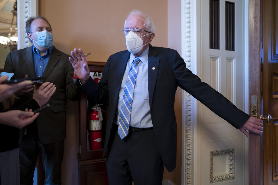 Senate Budget Committee Chairman Bernie Sanders, I-Vt., pauses to take questions from reporters as he arrives for a Democratic strategy meeting, at the Capitol in Washington, Tuesday, Nov. 16, 2021. (AP Photo/J. Scott Applewhite)