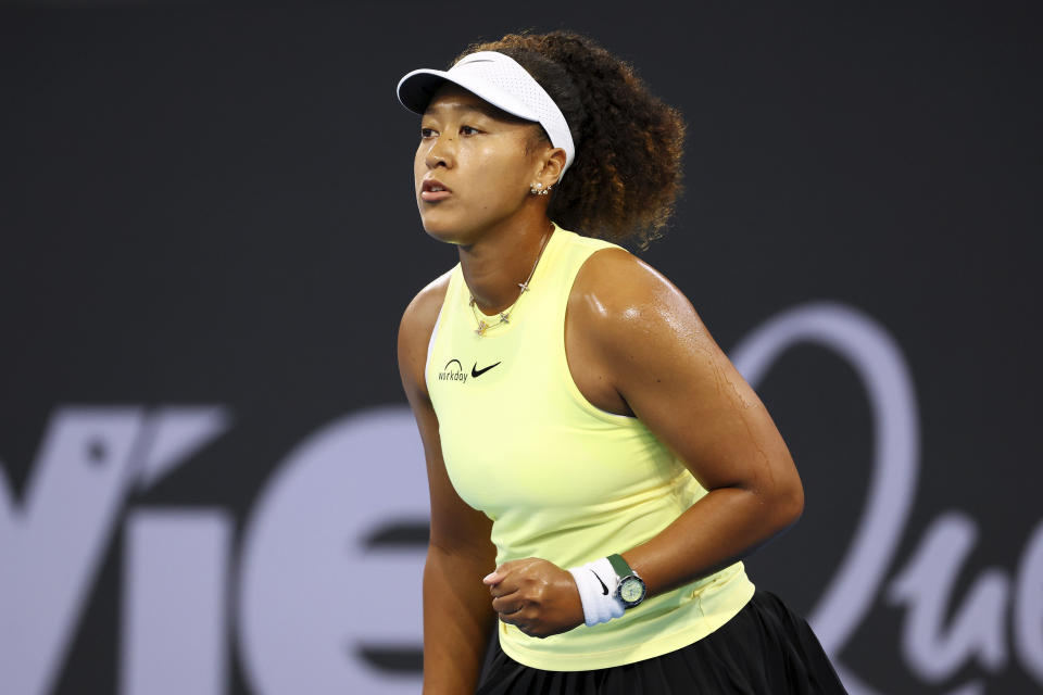 Naomi Osaka of Japan reacts after winning a point in her match against Tamara Korpatsch of Germany during the Brisbane International tennis tournament in Brisbane, Australia, Monday, Jan. 1, 2024. (AP Photo/Tertius Pickard)