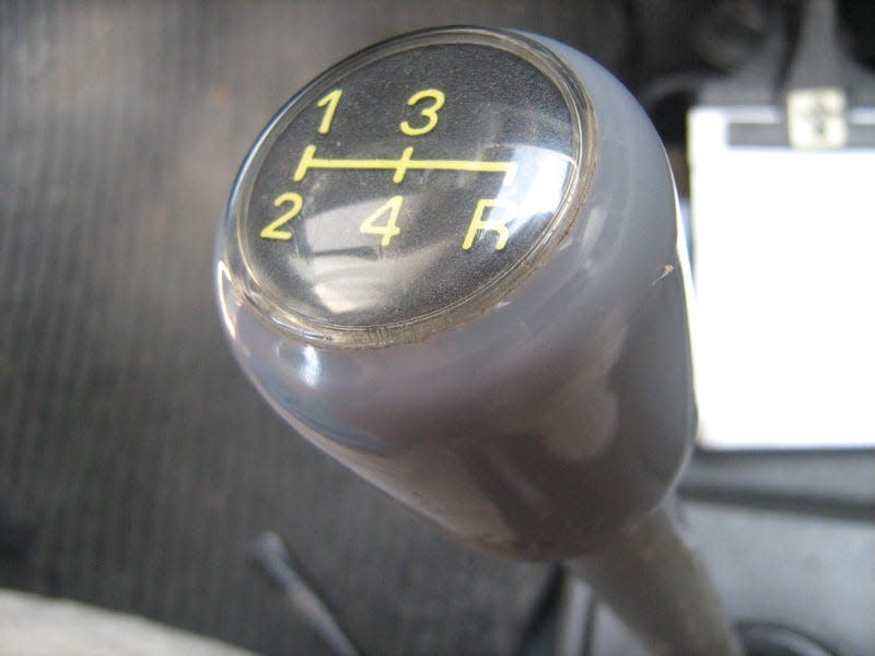 a close-up photo of a Yugo shift lever