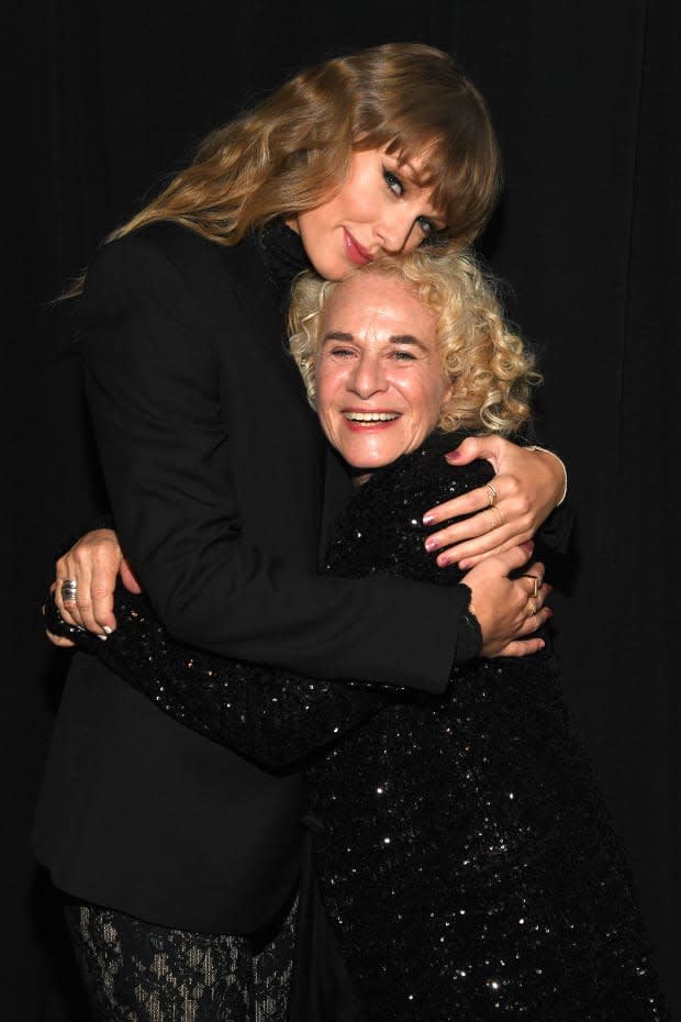 <p> Taylor Swift poses with <strong><a href="https://parade.com/1296637/michelle-scheraga-new/carole-king-husband/" rel="nofollow noopener" target="_blank" data-ylk="slk:Carole King;elm:context_link;itc:0;sec:content-canvas" class="link ">Carole King</a> </strong>at the 36th annual Rock & Roll Hall Of Fame Induction Ceremony on Oct. 30, 2021. Swift performed "Will You Still Love Me Tomorrow" in honor of the iconic singer-songwriter.</p><p>Kevin Mazur/Getty Images for The Rock and Roll Hall of Fame</p>