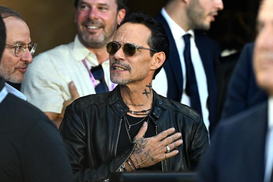 Marc Anthony at Lionel Messi's first match.